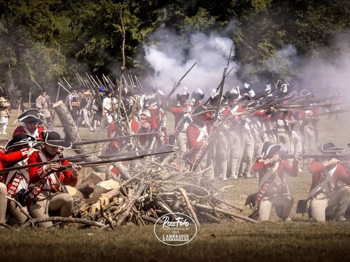 The 33rd firing a volley through musket smoke